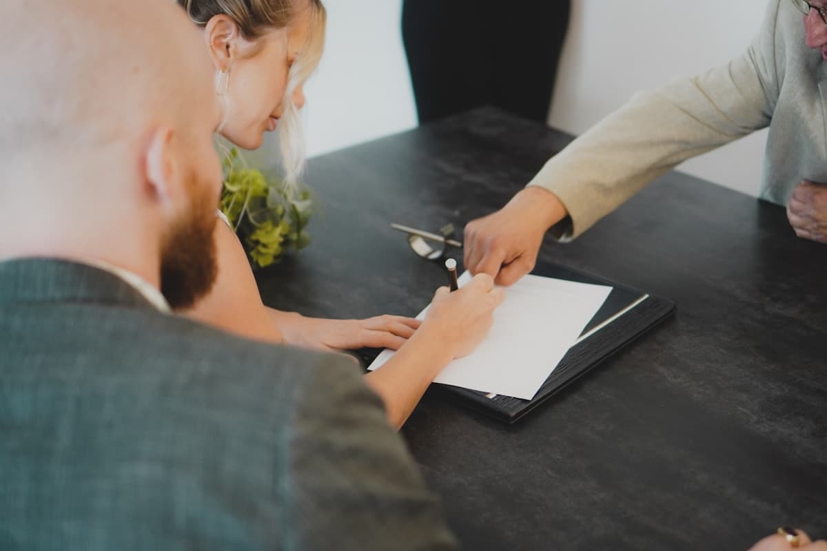 A tenancy agreement and pen on a table