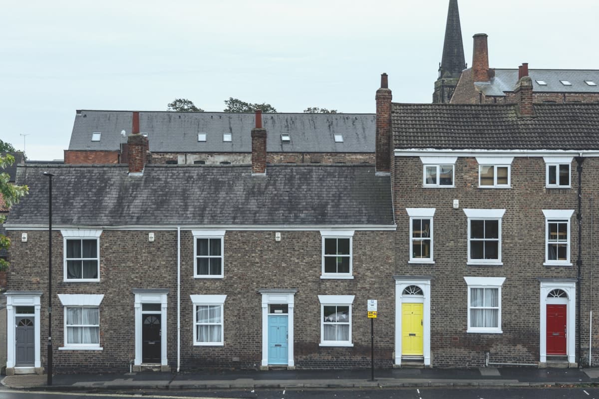 A row of traditional British terraced houses